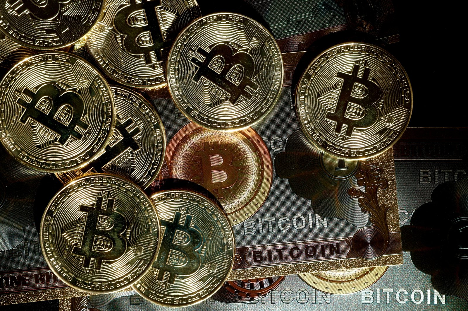 Representations of the cryptocurrency Bitcoin are seen in this illustration picture taken in Paris, France, March 9, 2024. (Reuters Photo)