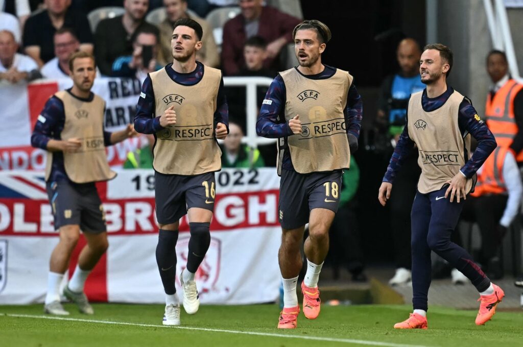 England's striker #20 Harry Kane (L), England's midfielder #16 Declan Rice (2nd L), England's midfielder #18 Jack Grealish (2nd R) and England's midfielder #19 James Maddison warm up on the side of the pitch during the International friendly football match between England and Bosnia-Herzegovina at St James' Park in Newcastle, England, June 3, 2024. (AFP Photo)