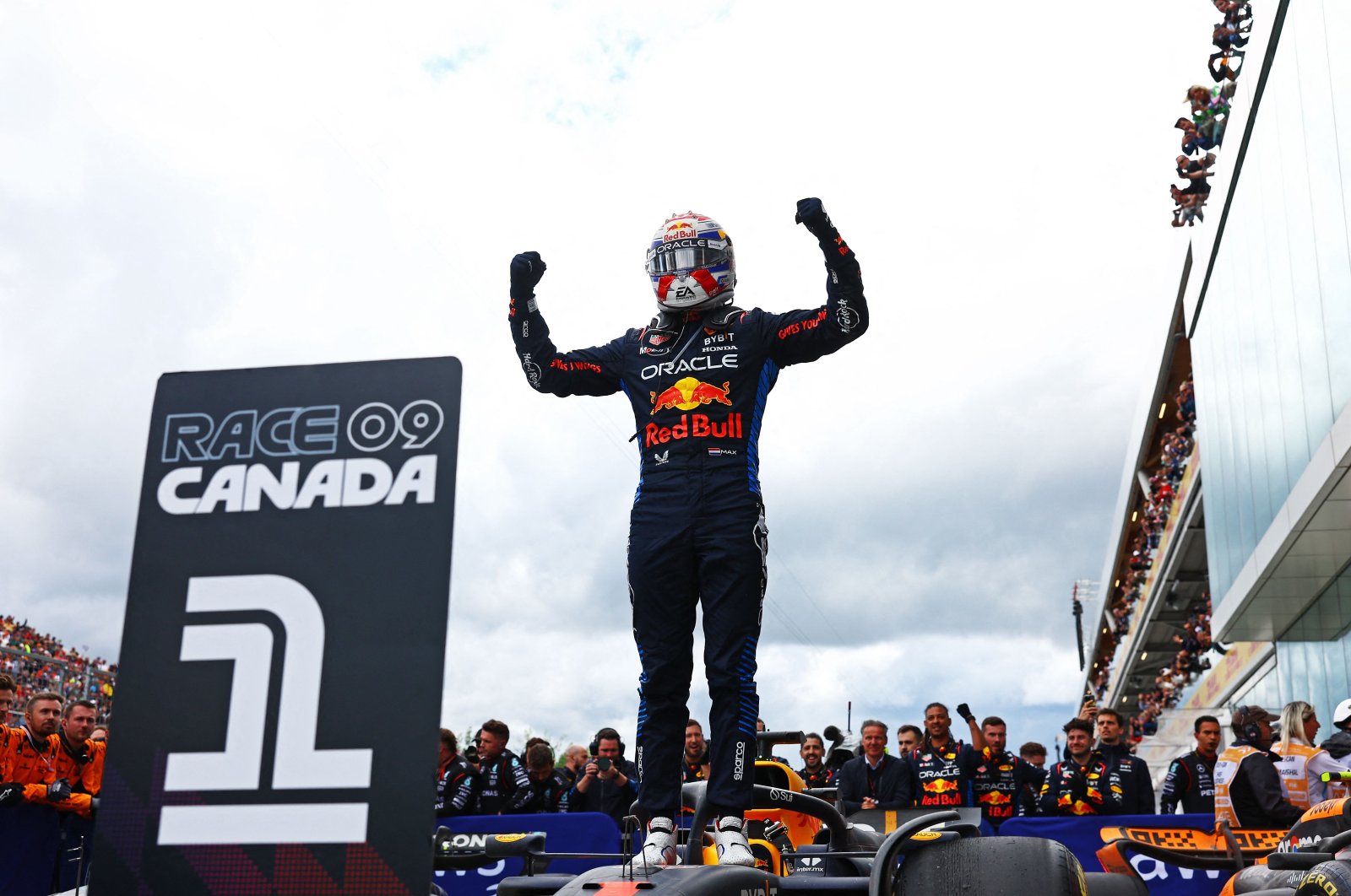 Oracle Red Bull Racing's Dutch driver Max Verstappen celebrates in parc ferme during the F1 Grand Prix of Canada at Circuit Gilles Villeneuve, Montreal, Quebec, Canada, June 09, 2024. (AFP Photo)