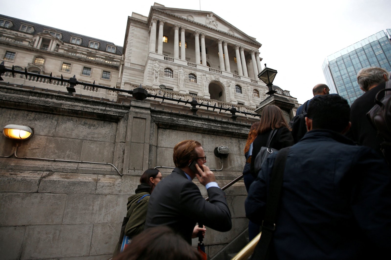 Commuters exit the underground in front of the Bank of England, London, Britain, Oct. 7, 2016. (Reuters Photo)