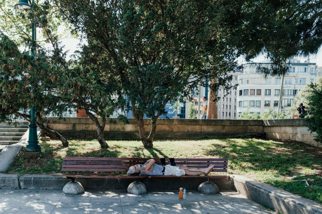 A man rests in a park in Istanbul, Türkiye, June 5, 2024. (Getty Images Photo)