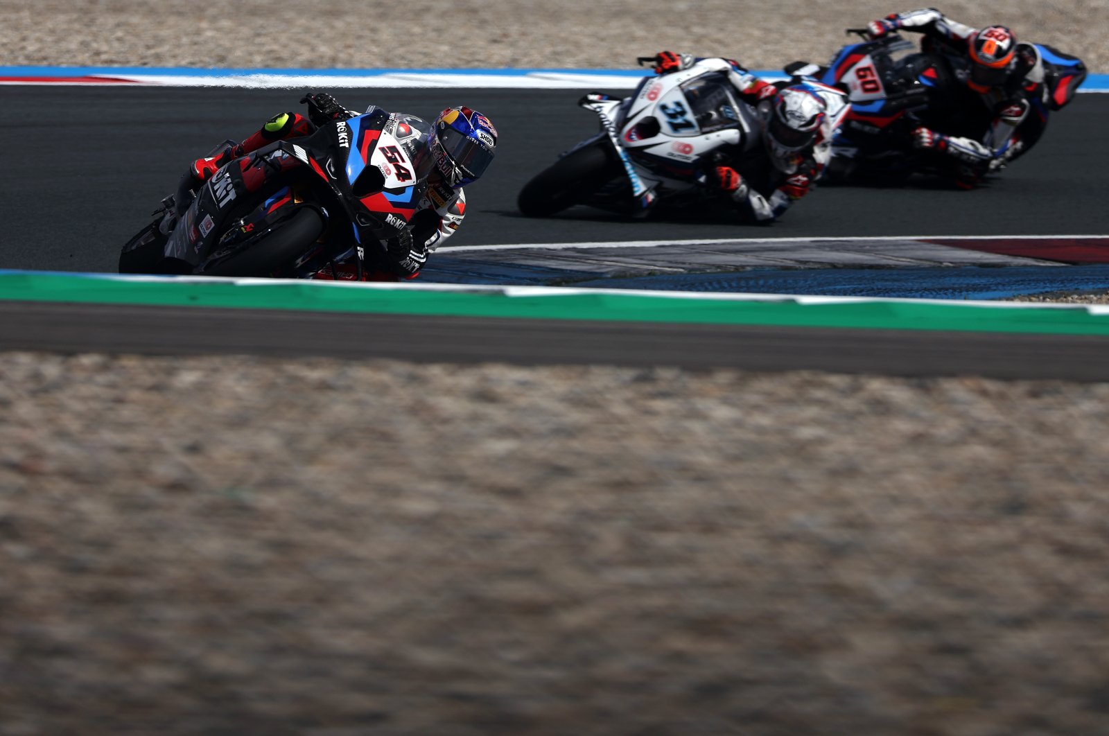 Türkiye's Toprak Razgatlıoğlu (L) riding a BMW M1000RR for team Germany ROKiT BMW Motorrad WorldSBK Team competes in the WorldSBK or Superbike World Championship, second practice session held at TT Circuit Assen, Assen, Netherlands, April 19, 2024. (Getty Images Photo)