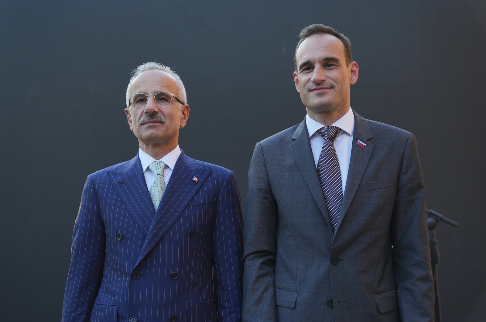 Transport and Infrastructure Minister Abdulkadir Uraloğlu (L) and Slovenia's Ambassador to Ankara, Gorazd Rencelj, pose for a photo during an event in Ankara, Türkiye, June 6, 2024. (AA Photo)