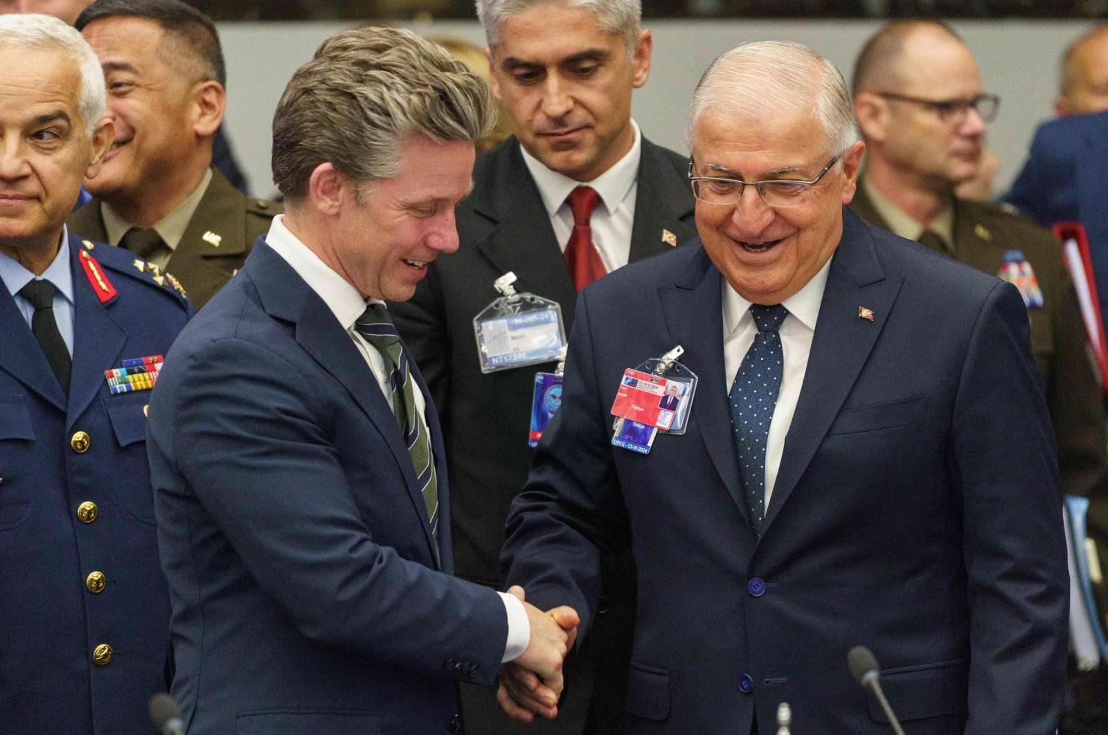 Yaşar Güler and Sweden's Minister of Defense Pal Jonson shake hands before a meeting of the Ukraine Defense Contact Group, during the NATO Ministers of Defence at NATO Headquarters in Brussels on June 13, 2024. (AFP Photo)