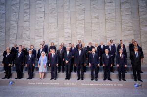 Defense Minister Yaşar Güler (3rd R) poses alongside counterparts for a family photo at the NATO defense ministers' meeting at the Alliance's headquarters, Brussels, Belgium June 14, 2024. (Reuters Photo)