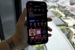 Photo shows a hand holding a phone showing the Galatasaray Instagram page. (Courtesy of Kelvin Ndunga)
