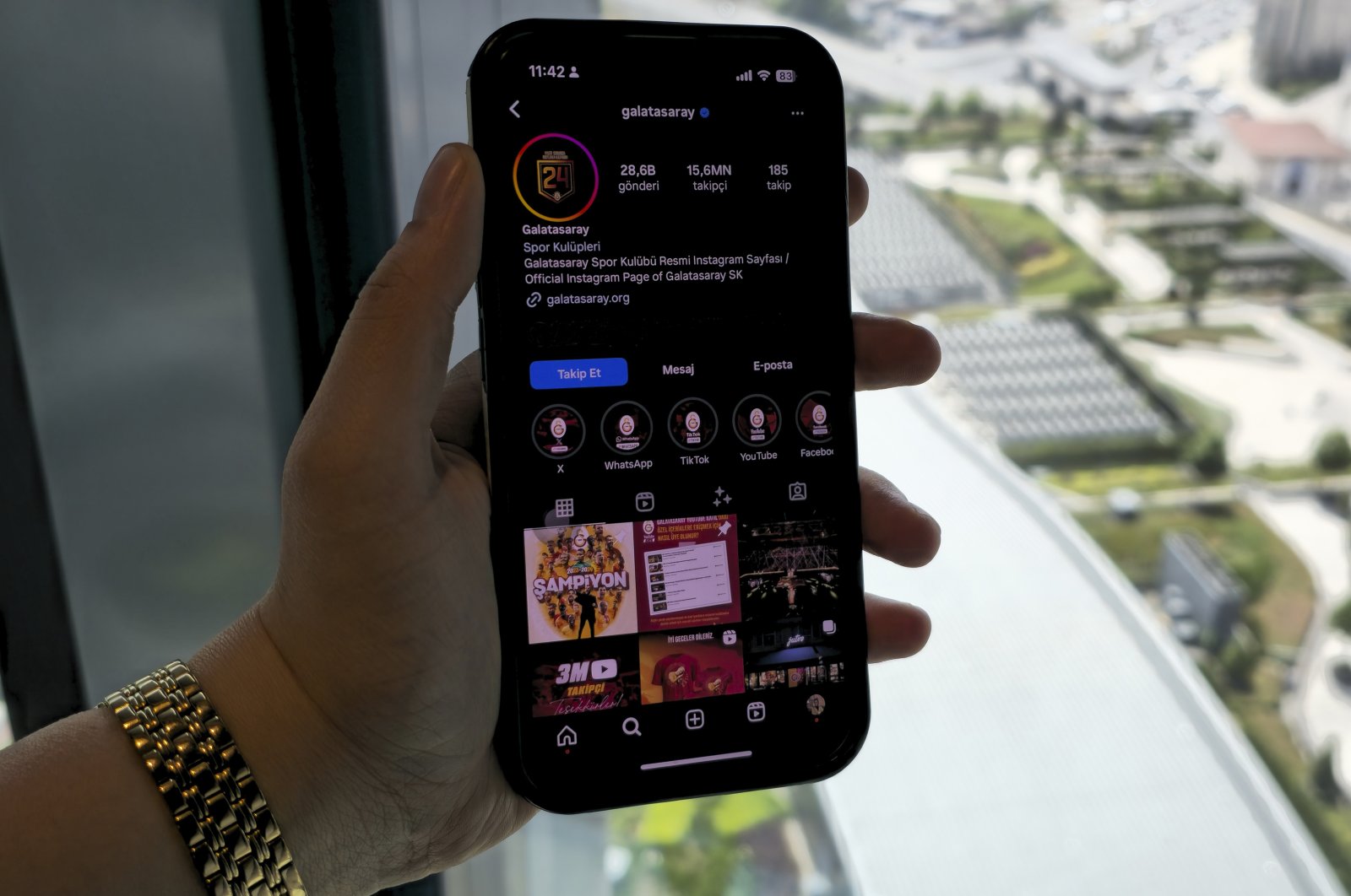 Photo shows a hand holding a phone showing the Galatasaray Instagram page. (Courtesy of Kelvin Ndunga)