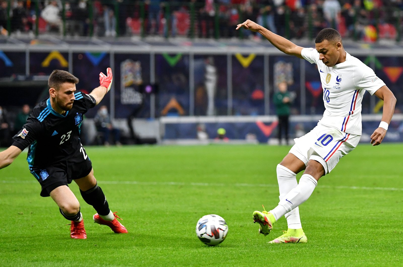 Kylian Mbappe of France scores their side's second goal past Unai Simon of Spain during the UEFA Nations League 2021 Final match between Spain and France at San Siro Stadium, Milan, Italy, Oct. 10, 2021. (Getty Images Photo)