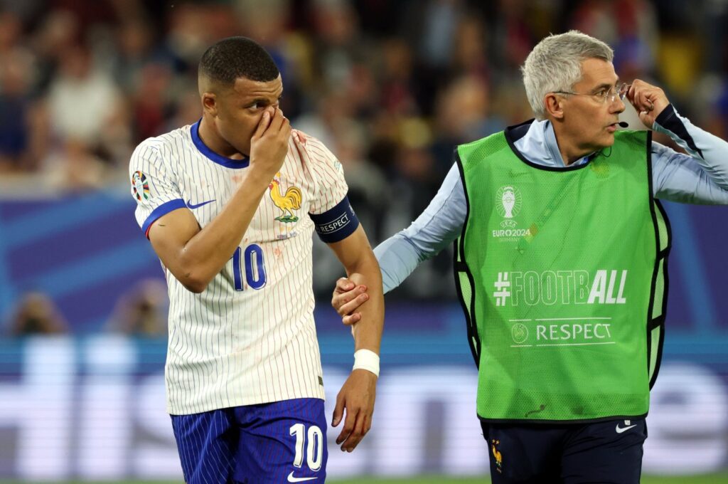 France's Kylian Mbappe (L) reacts after an injury during the Euro 2024 Group D match against Austria, Dusseldorf, Germany, June 17, 2024. (EPA Photo)