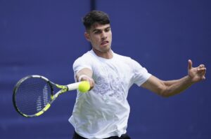 Spain's Carlos Alcaraz practices with Britain's Andy Murray on Day 3 of The Queen's Club Championship, London, U.K., June 17, 2024. (AP Photo)
