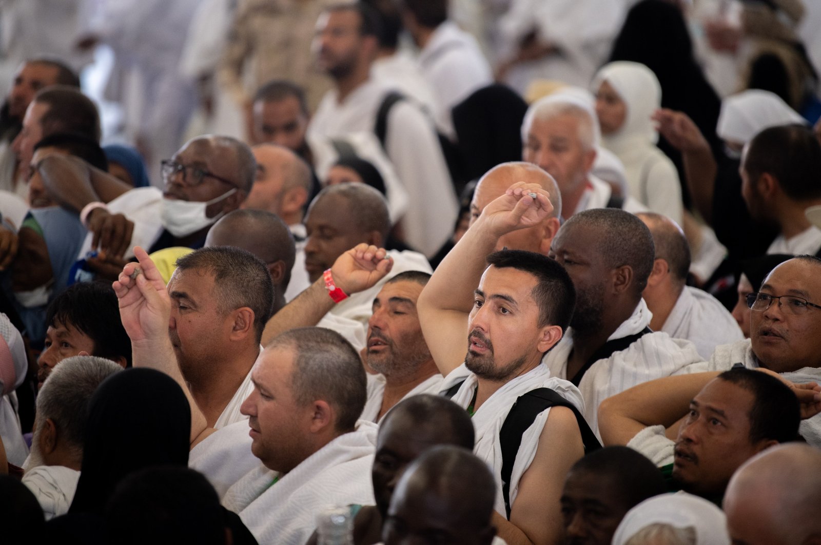 Muslim pilgrims participate in the symbolic stoning of the devil ritual at the Jamarat Bridge during the Hajj pilgrimage near Mecca, Saudi Arabia, June 16, 2024. (EPA Photo)