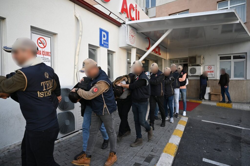Suspects detained as part of an investigation into Mossad's activities in Türkiye are escorted by police to undergo routine medical checks, Istanbul, Türkiye, Jan. 4, 2024. (AA Photo)