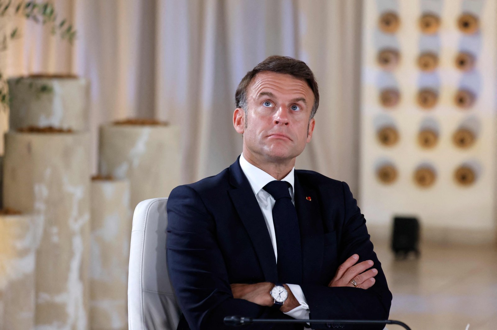 French President Emmanuel Macron looks on as he attends a work session during the G-7 Summit in Borgo Egnazia, southern Italy, June 13, 2024. (AFP Photo)