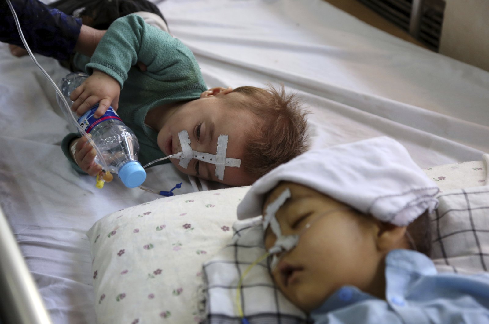 Afghan children receive treatment for respiratory problems at a pediatric hospital, in Kabul, Afghanistan, Oct. 15, 2019. (AP File Photo)
