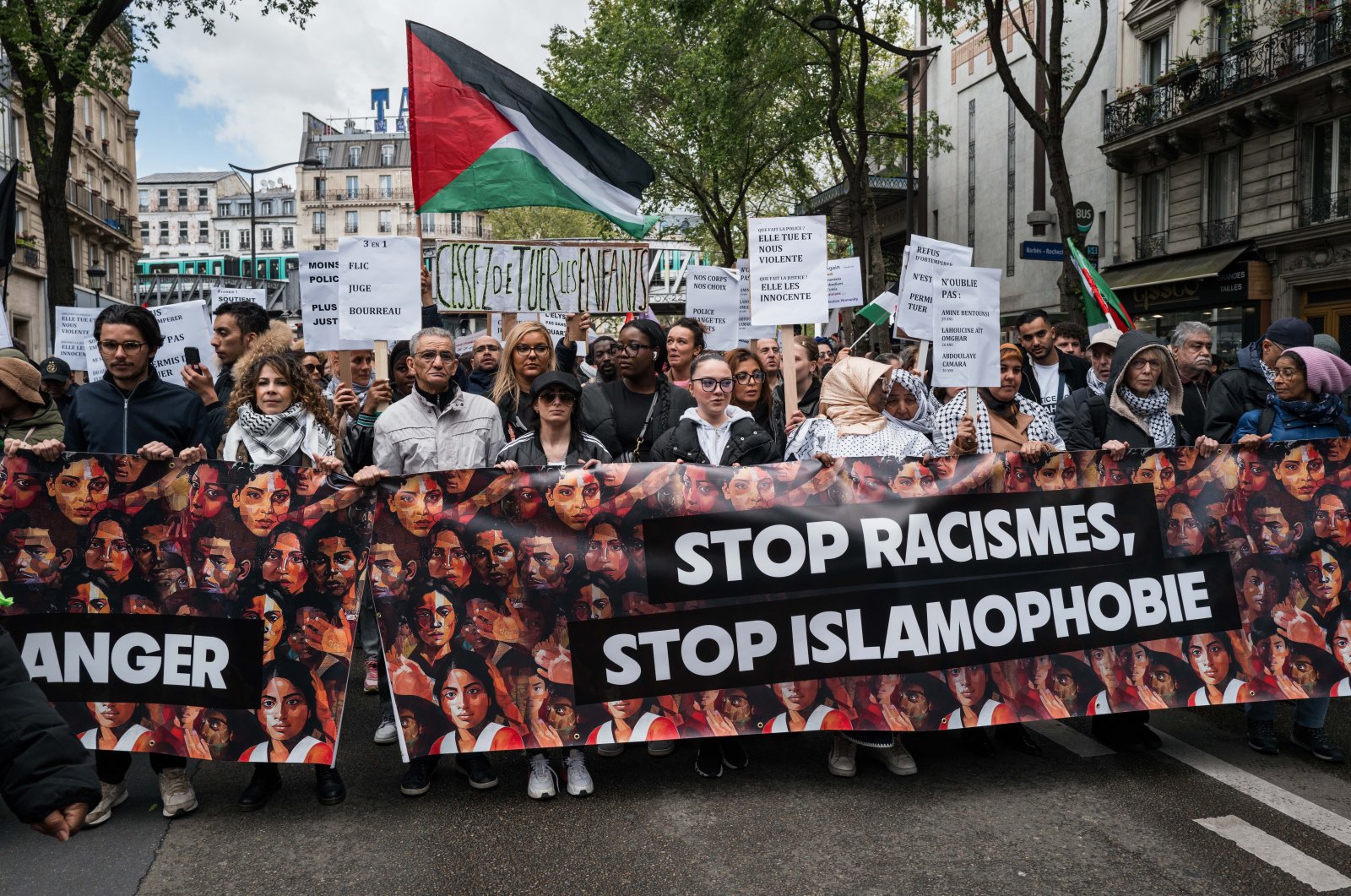Demonstrators are holding a banner that reads "Stop Racism, Stop Islamophobia" during a protest against racism and Islamophobia in Paris, France, on April 21, 2024. (Reuters File Photo)