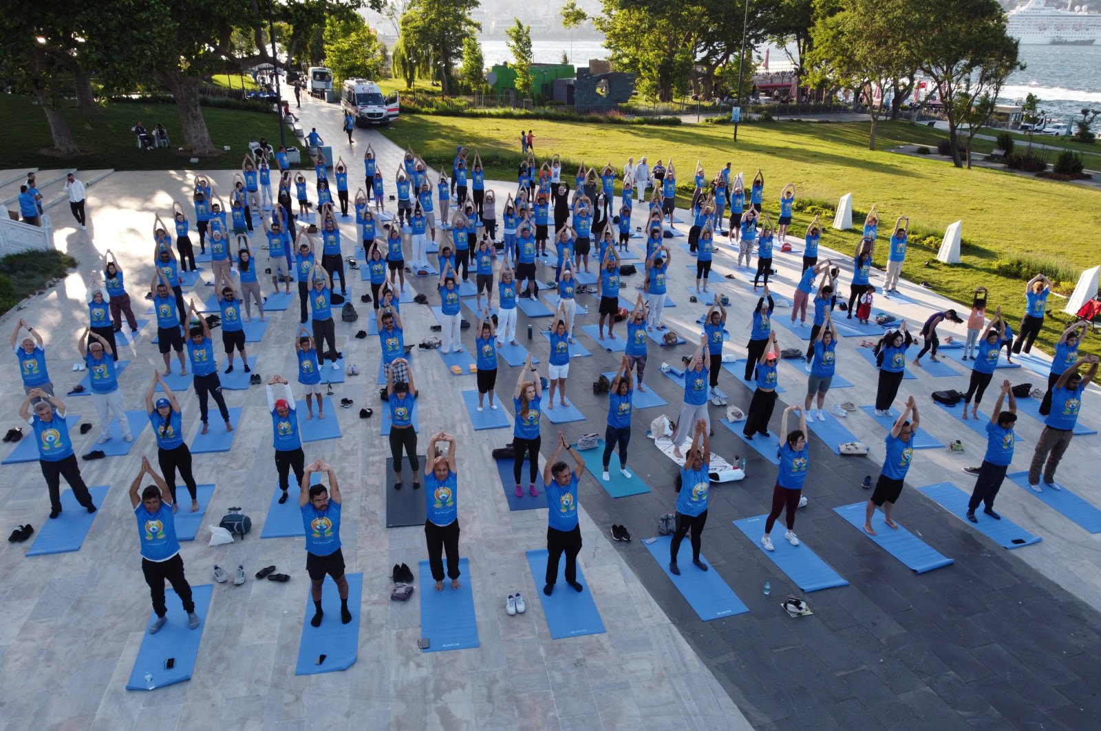A drone view shows participants practicing yoga during the 10th International Day of Yoga, Istanbul, Türkiye, June 21, 2024. (Reuters Photo)
