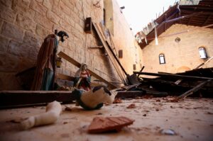 A broken statue lies at St. Georgios Church damaged in Israeli attacks in Yaroun, southern Lebanon, June 21, 2024. (EPA Photo)
