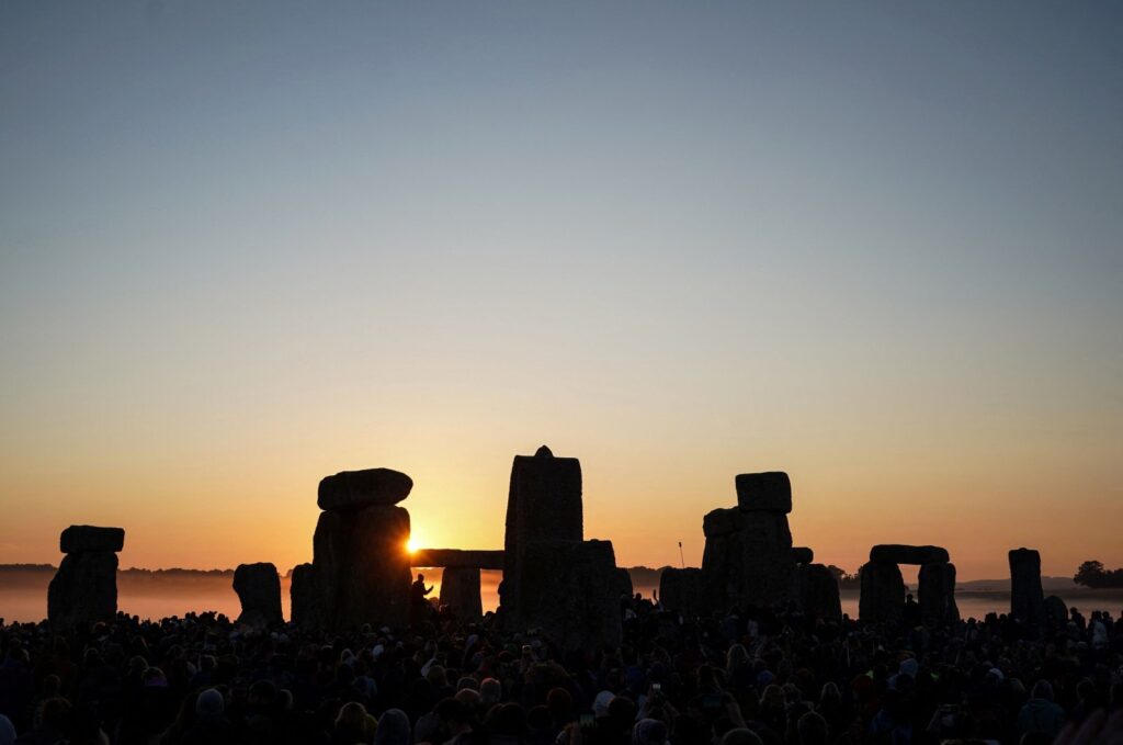 The sun rises at Stonehenge, near Amesbury, in Wiltshire, southern England, June 21, 2024. (AFP Photo)