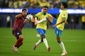 Costa Rica's Warren Madrigal (L) fights for the ball with Brazil's Marquinhos (R) and Eder Militao during the Conmebol 2024 Copa America tournament Group D football match between Brazil and Costa Rica at SoFi Stadium, Inglewood, California, U.S., June 24, 2024. (AFP Photo)