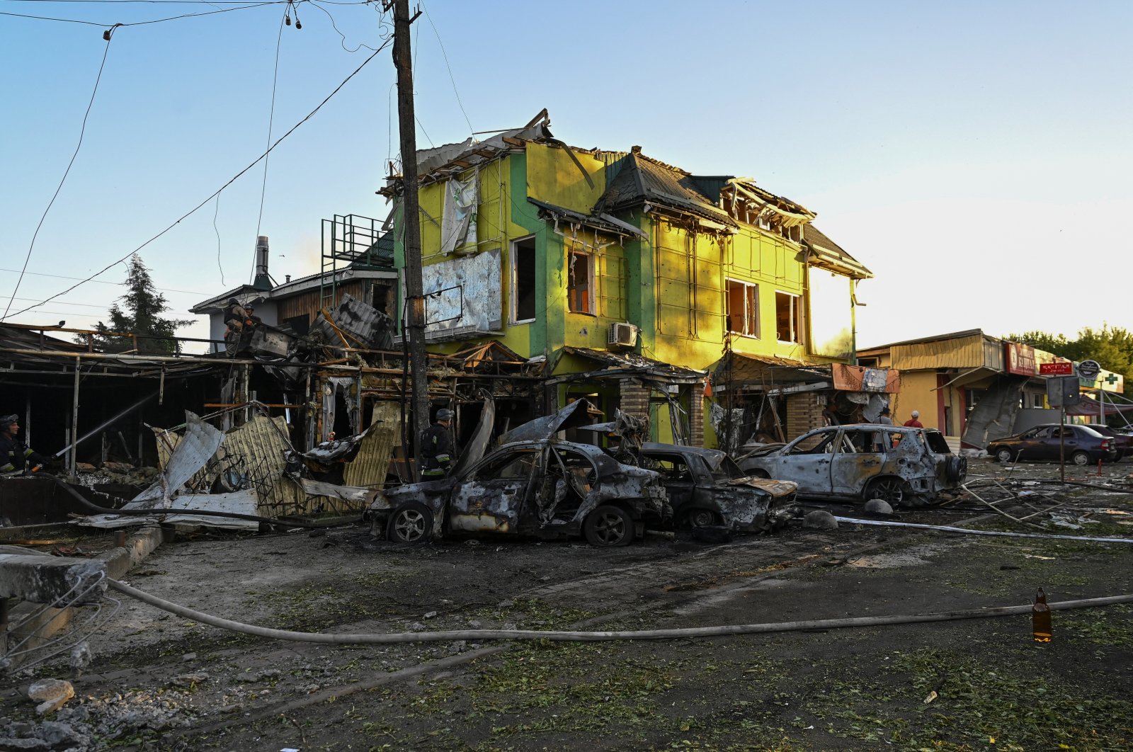 Firefighters work at a site of a Russian missile strike in the town of Vilniansk, Zaporizhzhia region, Ukraine, June 29, 2024. (Reuters Photo)