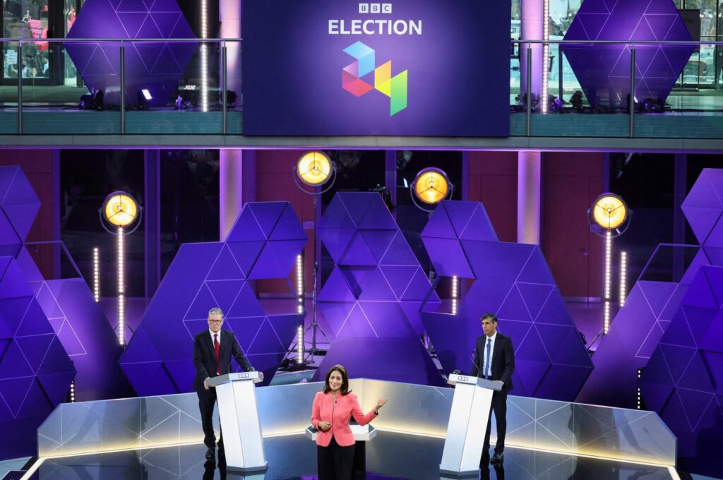 U.K. Labour Party leader Keir Starmer (L) and Britain's Prime Minister and Conservative Party leader Rishi Sunak (R) attend a live TV debate, hosted by The BBC, in Nottingham, Britain, June 26, 2024. (AFP Photo)