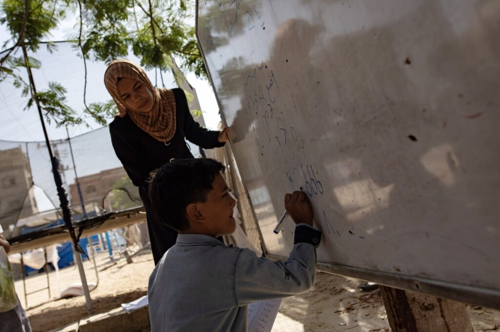 Palestinian students attend a class in a tent school in the Khan Younis refugee camp in the southern Gaza Strip, Palestine, June 13, 2024. (EPA Photo)