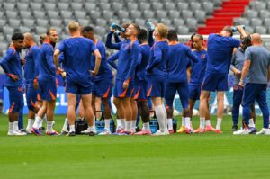 From left, Netherlands' midfielder #20 Ian Maatsen, Netherlands' defender #17 Daley Blind, Netherlands' midfielder #16 Joey Veerman, Netherlands' forward #07 Xavi Simons and Netherlands' defender #04 Virgil Van Dijk attend an MD-1 training session on the eve of the UEFA Euro 2024 round of 16 football match against Romania at the Munich Football Arena in Munich, Germany, July 1, 2024. (AFP Photo)
