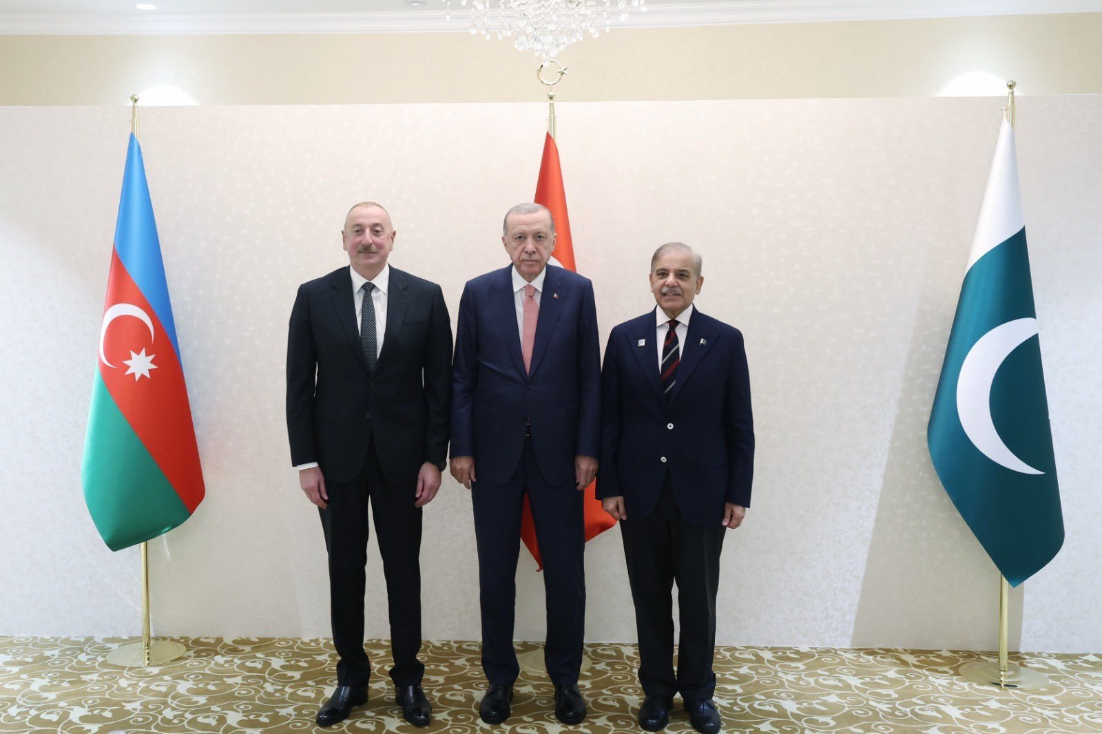 President Recep Tayyip Erdoğan, Azerbaijani President Ilham Aliyev and Pakistani Prime Minister Shahbaz Sharif pose for a photo in Astana, July 3, 2024. (DHA Photo)
