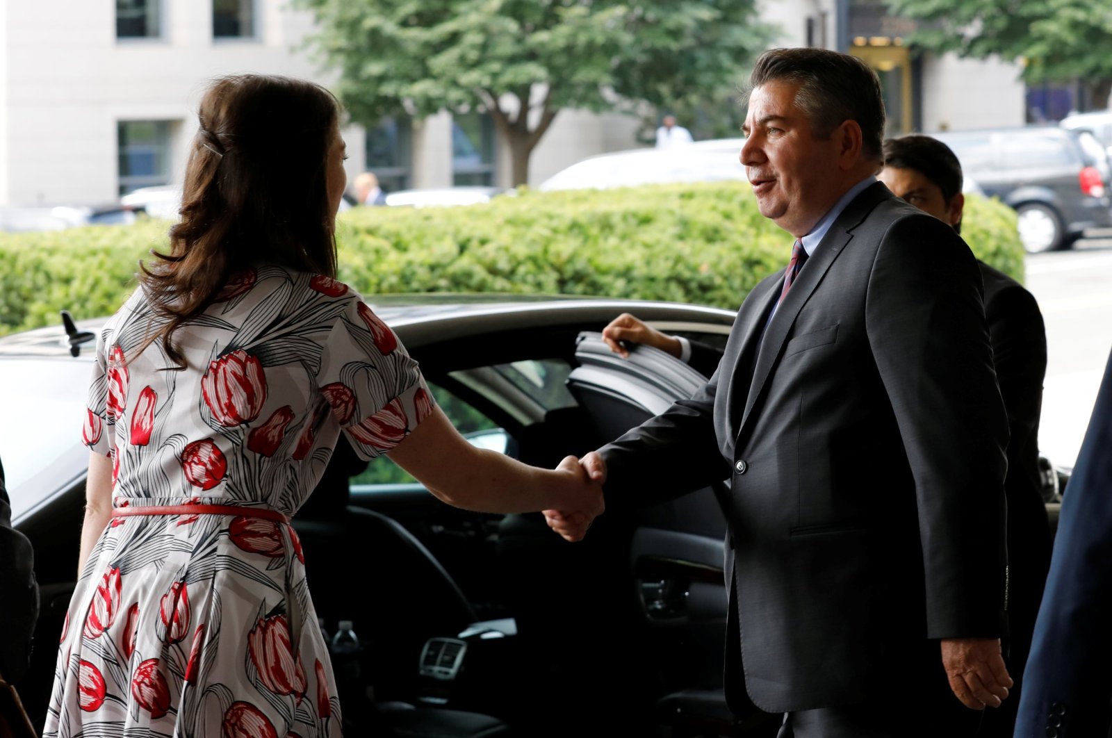 Then-Deputy Foreign Minister Sedat Önal shakes hands with a U.S. State Department protocol official after his meeting with Deputy Secretary of State John Sullivan at the State Department, Washington, U.S., Aug. 8, 2018. (Reuters File Photo)