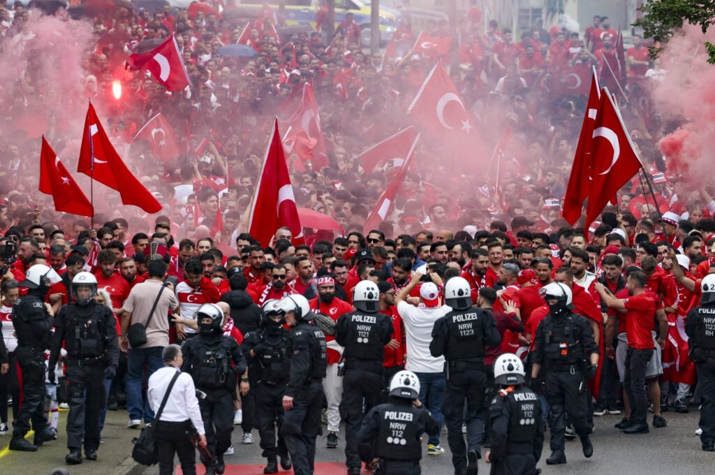 Turkish fans march toward the stadium ahead of a Euro 2024 Group F match against Georgia, Dortmund, Germany, June 18, 2024. (AP Photo)