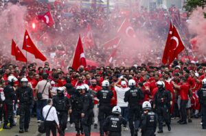 Turkish fans march toward the stadium ahead of a Euro 2024 Group F match against Georgia, Dortmund, Germany, June 18, 2024. (AP Photo)