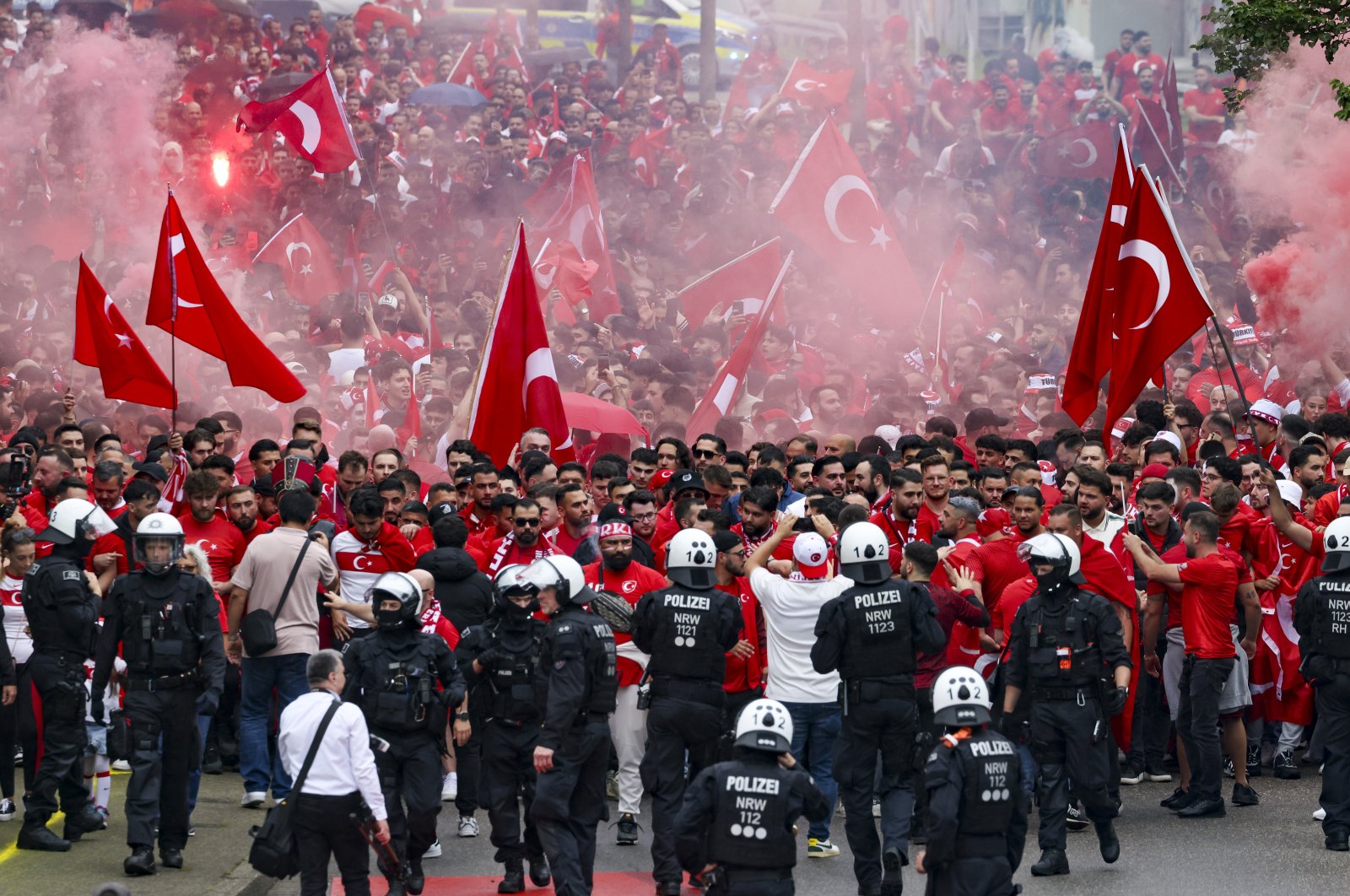 Turkish fans march toward the stadium ahead of a Euro 2024 Group F match against Georgia, Dortmund, Germany, June 18, 2024. (AP Photo)
