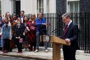 Guests watch as new British Prime Minister Keir Starmer delivers his speech outside Number 10 Downing Street, following the results of the general election, in London, Britain, July 5, 2024. (Reuters Photo)