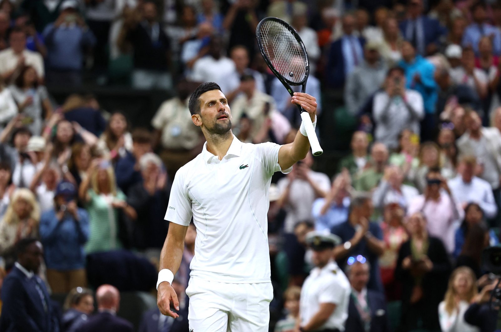 Serbia's Novak Djokovic celebrates after winning his fourth round match against Denmark's Holger Rune, London, U.K., July 8, 2024. (Reuters Photo)