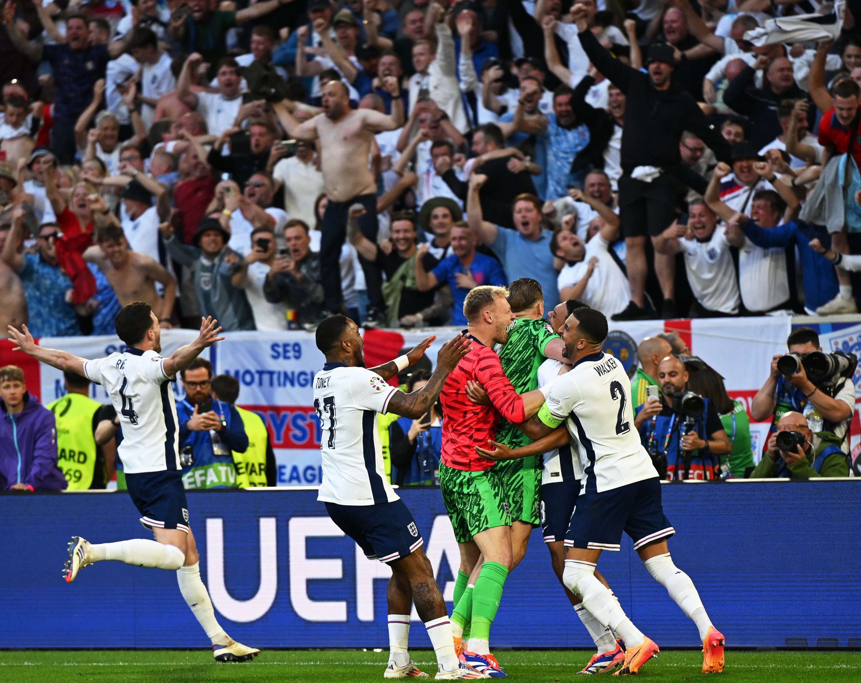 336001 England players celebrate after winning the UEFA Euro 2024 quarterfinals match's penalty shootout against Switzerland, Dusseldorf, Germany, July 4, 2024. (Getty Images Photo)