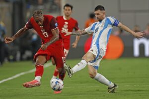 Argentina's Lionel Messi (R) in action with Canada's Derek Cornelius during the CONMEBOL Copa America 2024 semi-finals match between Argentina and Canada, East Rutherford, New Jersey, U.S., July 9, 2024. (EPA Photo)