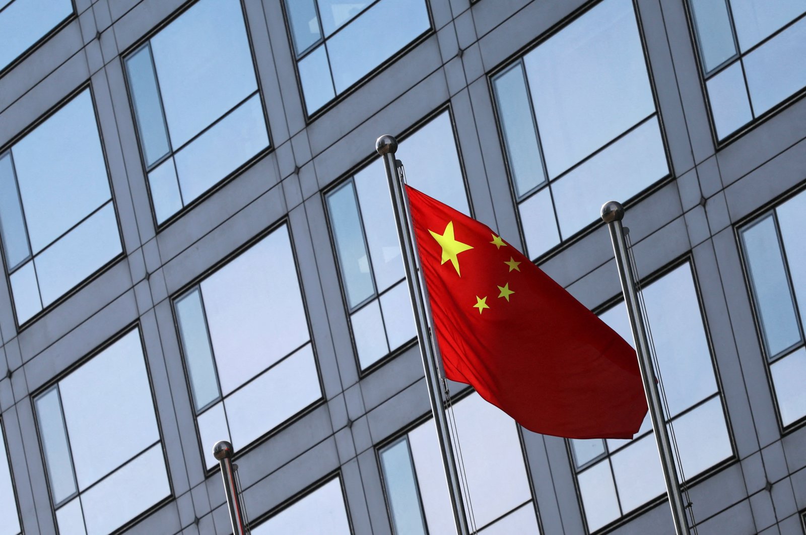 A Chinese flag flutters outside the China Securities Regulatory Commission (CSRC) building on Financial Street, Beijing, China, Feb. 8, 2024. (Reuters Photo)