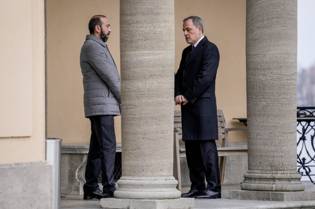 Azerbaijani Foreign Minister Jeyhun Bayramov (R) and his Armenian counterpart Ararat Mirzoyan meet for peace talks in Berlin, Germany, Feb. 28, 2024. (AP Photo)