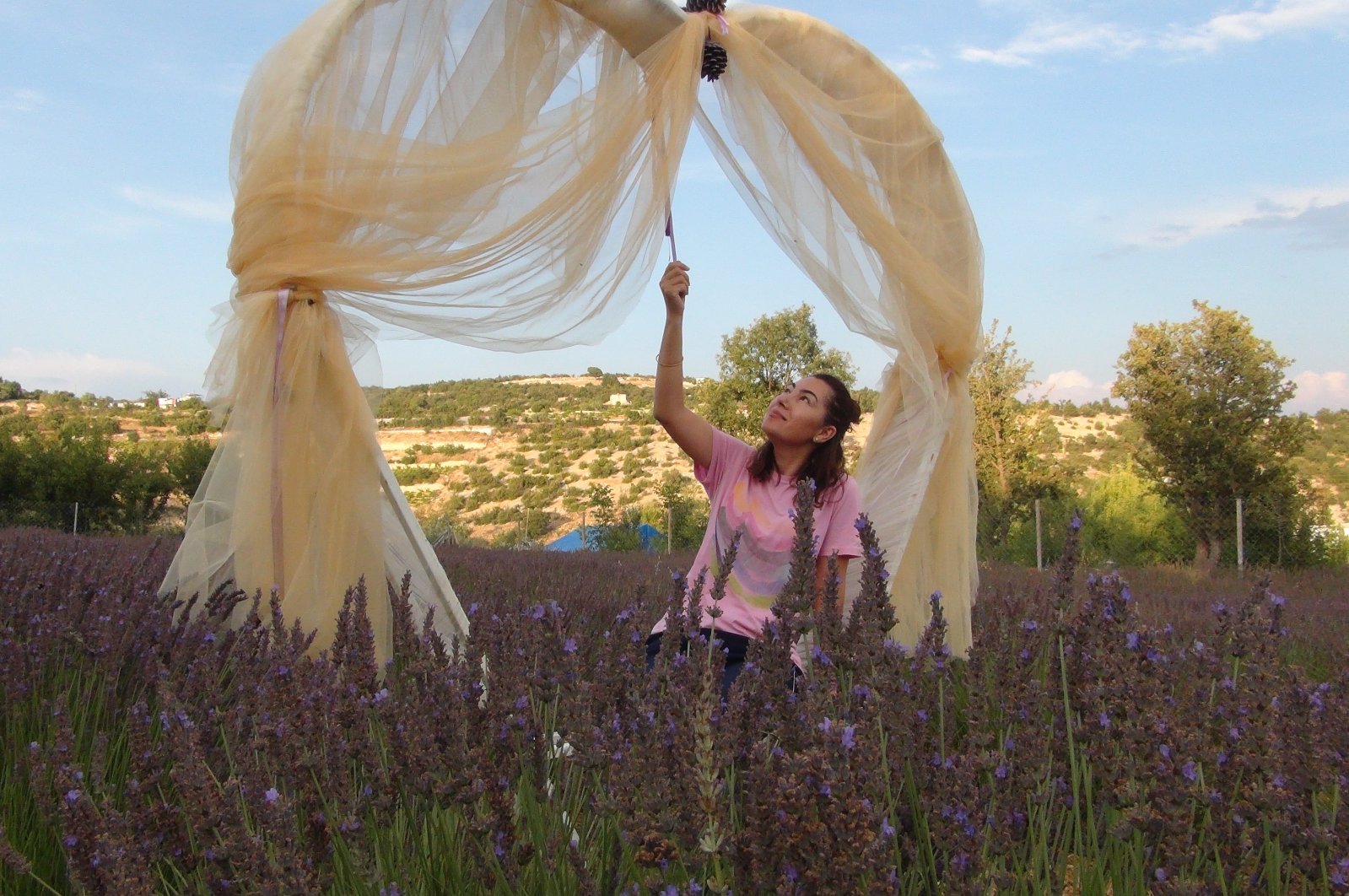Visitors delight in their time amid the lavender fields of Mersin, Türkiye, July 15, 2024. (IHA Photo)