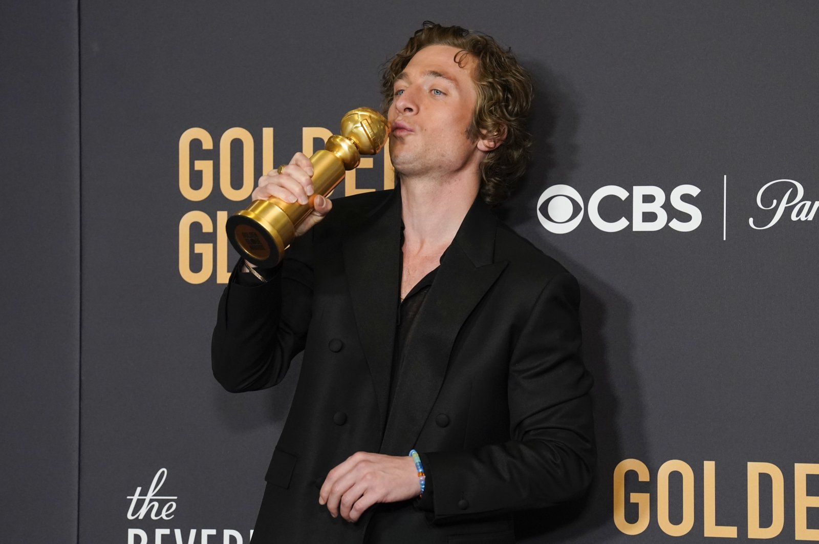 Jeremy Allen White poses in the press room with the award for best performance by an actor in a television series, musical or comedy for "The Bear" at the 81st Golden Globe Awards at the Beverly Hilton in Beverly Hills, California, U.S., Jan. 7, 2024. (AP Photo)