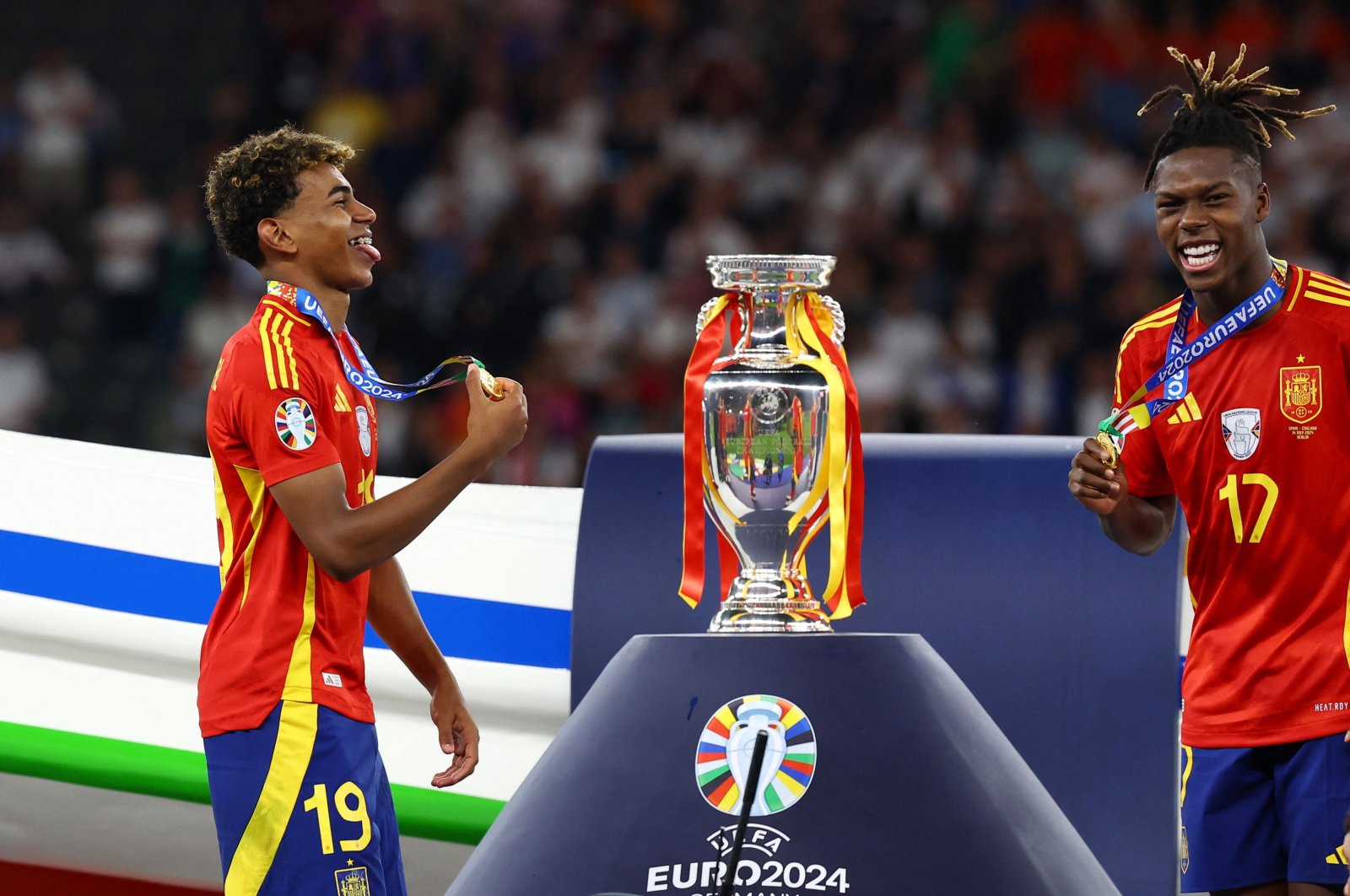 Spain's Lamine Yamal and Nico Williams celebrate after winning the Euro 2024 at the Berlin Olympiastadion, Berlin, Germany, July 14, 2024. (Reuters Photo)