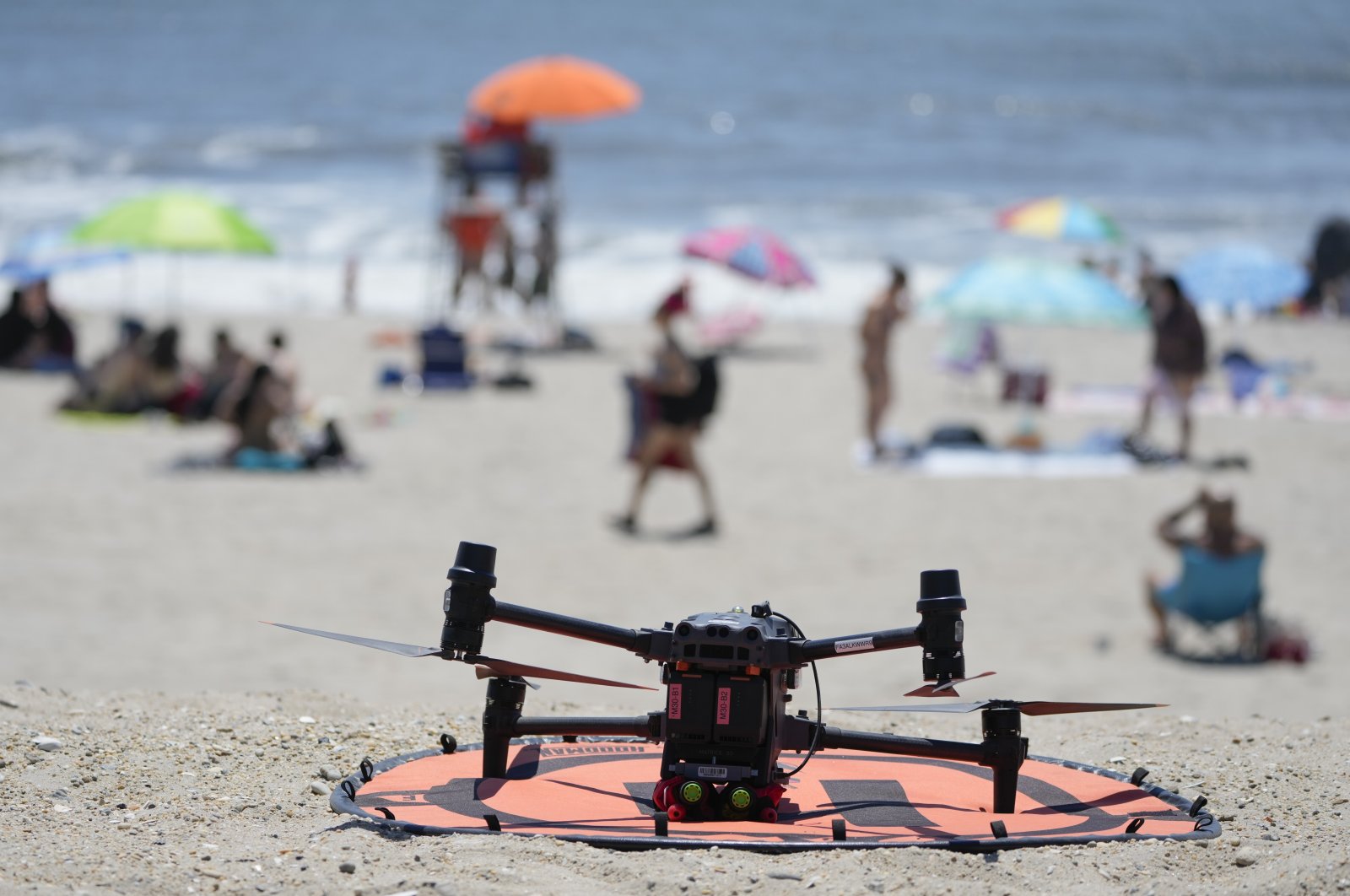 A drone with emergency flotation devices attached prepares to launch at Rockaway Beach, New York, U.S., July 11, 2024. (AP Photo)