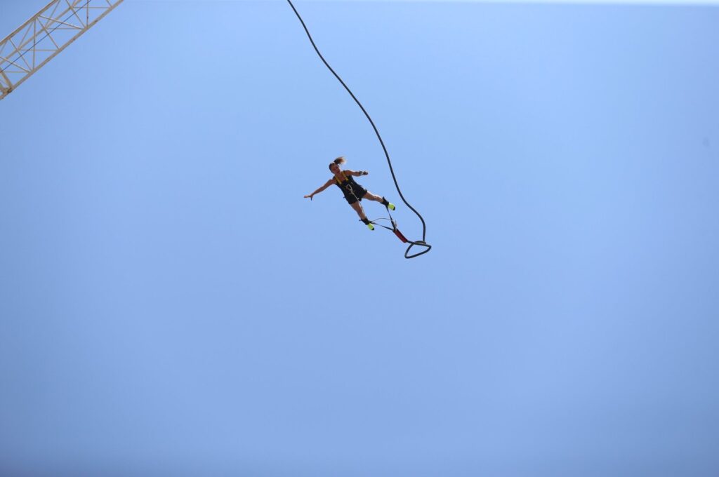 A woman is enjoying high-adrenaline moments with bungee jumping in Fethiye, Muğla, southwestern Türkiye, July 18i 2024. (AA Photo)
