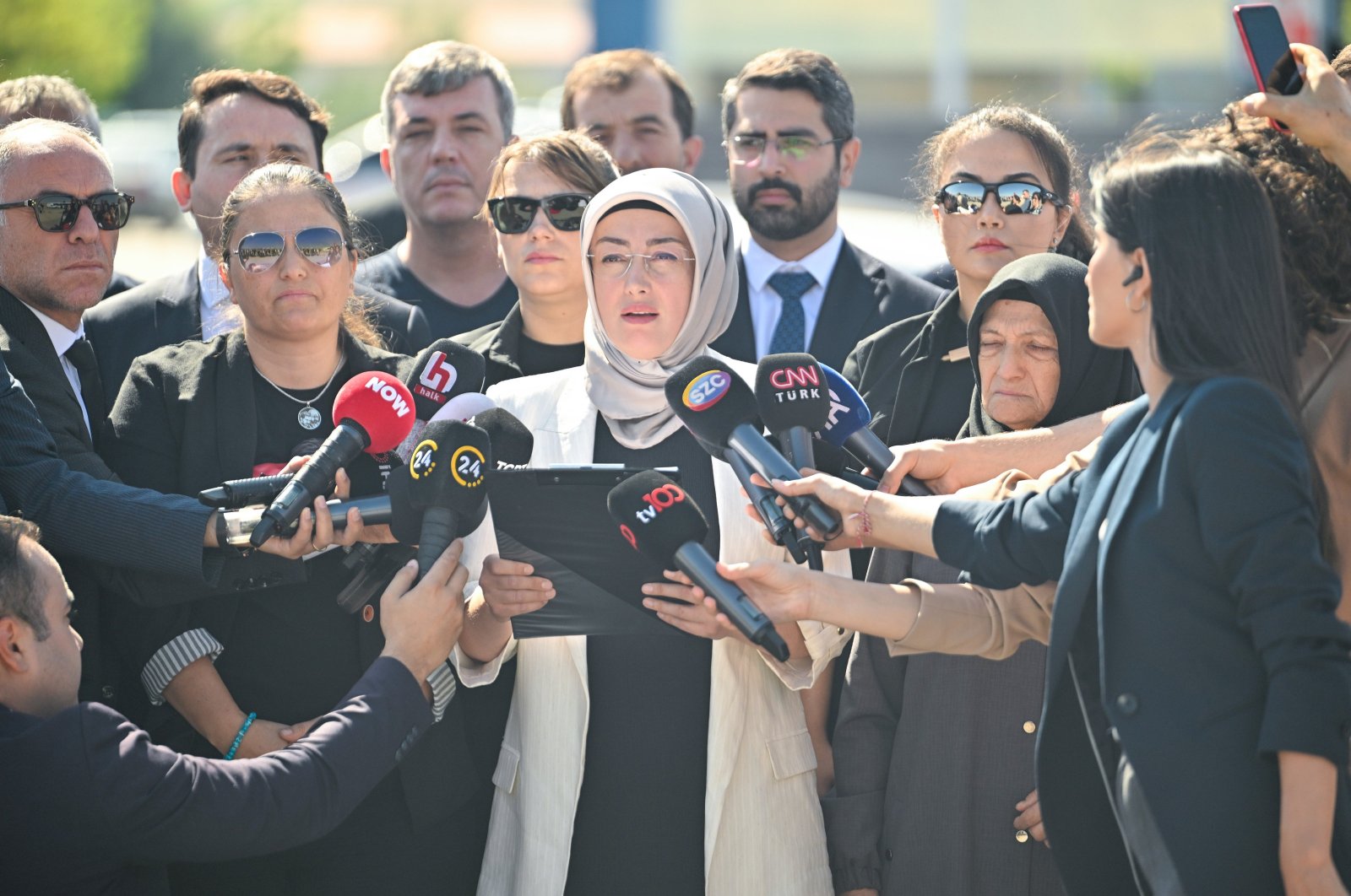 Ayşe Ateş (C), widow of Turkish nationalist Sinan Ateş who was murdered in 2022, holds a press briefing after a hearing in the capital Ankara, Türkiye, July 19, 2024. (AA Photo)