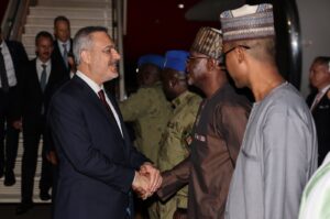 Local officials welcome Foreign Minister Hakan Fidan (L) at the airport, Niamey, Niger, July 17, 2024. (AA Photo)