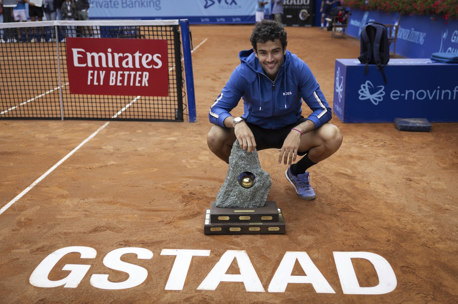 Italy's Matteo Berrettini poses with the trophy after winning the Swiss Open in Gstaad, Switzerland, July 21, 2024. (AP Photo)