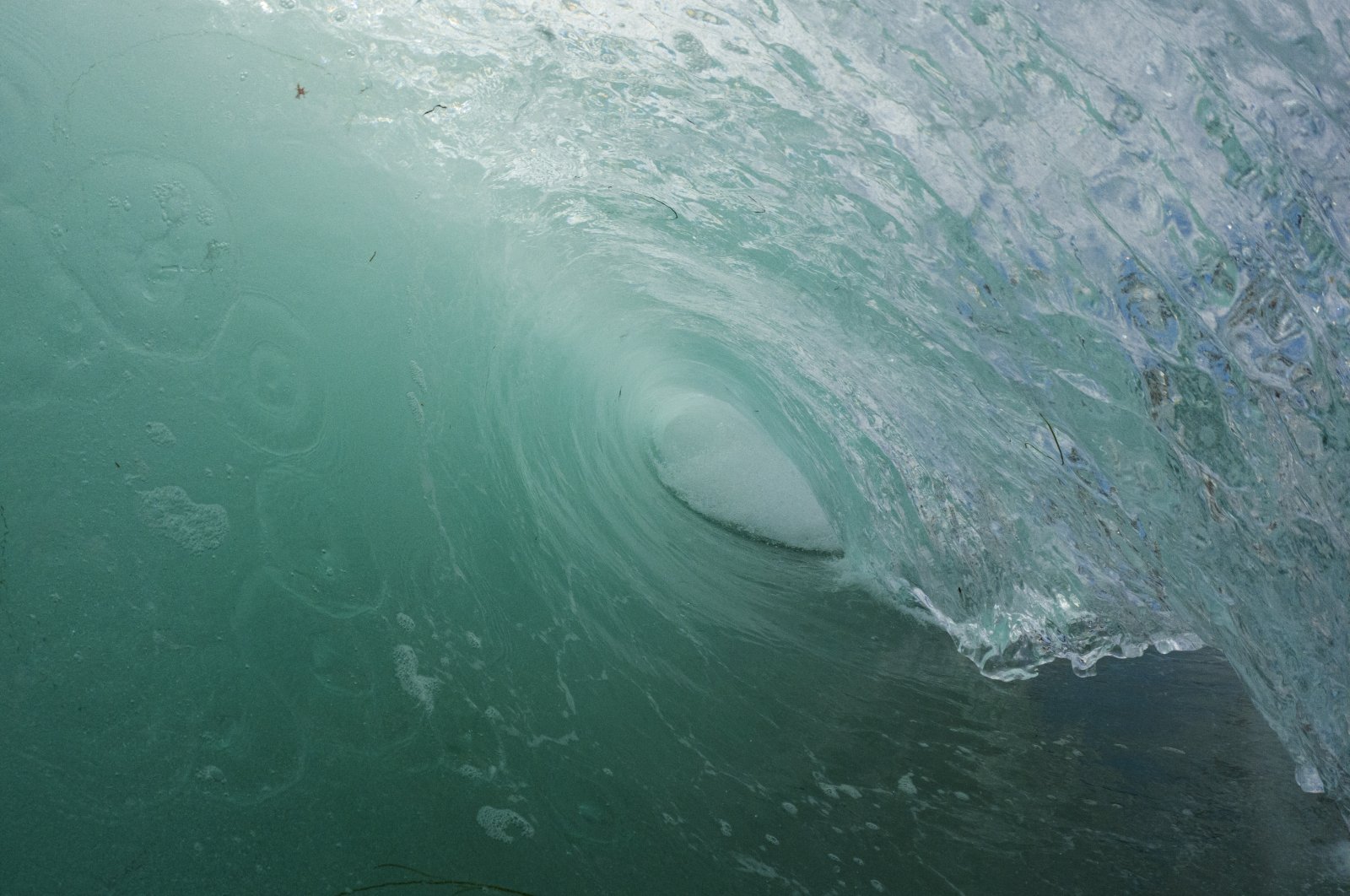 A wave in the Pacific Ocean breaks along the shore of La Jolla's Windansea Beach on a crowded summer day, in San Diego, California, U.S., July 2, 2023. (Getty Images Photo)