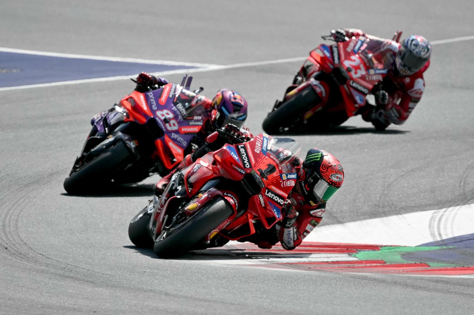 Ducati's Italian rider Francesco Bagnaia leads the pack in the Austrian MotoGP, Spielberg, Austria, Aug. 18, 2024. (AFP Photo)