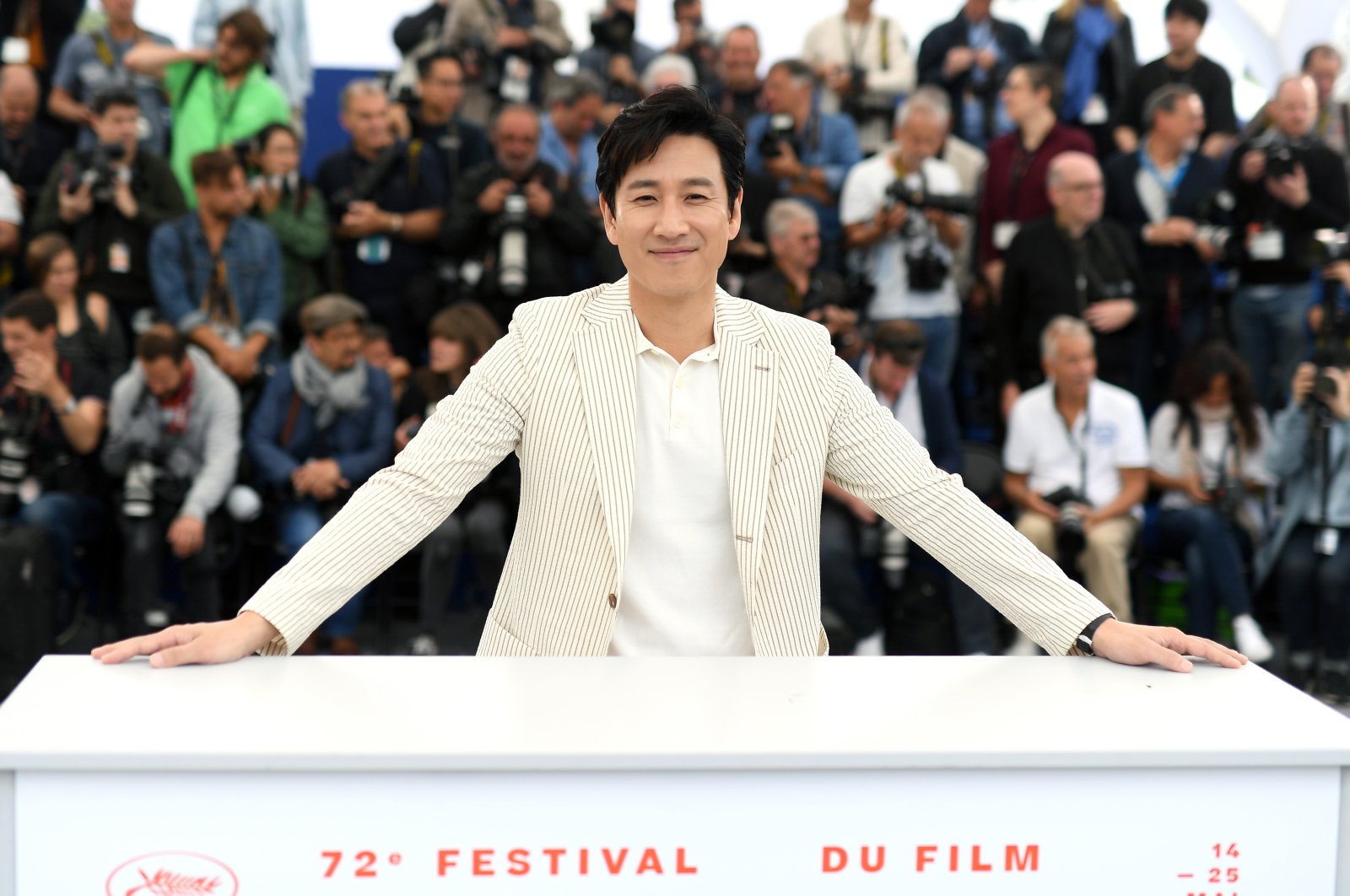 Lee Sun-kyun attends the photocall for "Parasite" during the 72nd annual Cannes Film Festival, Cannes, France, May 22, 2019. (Getty Images Photo)