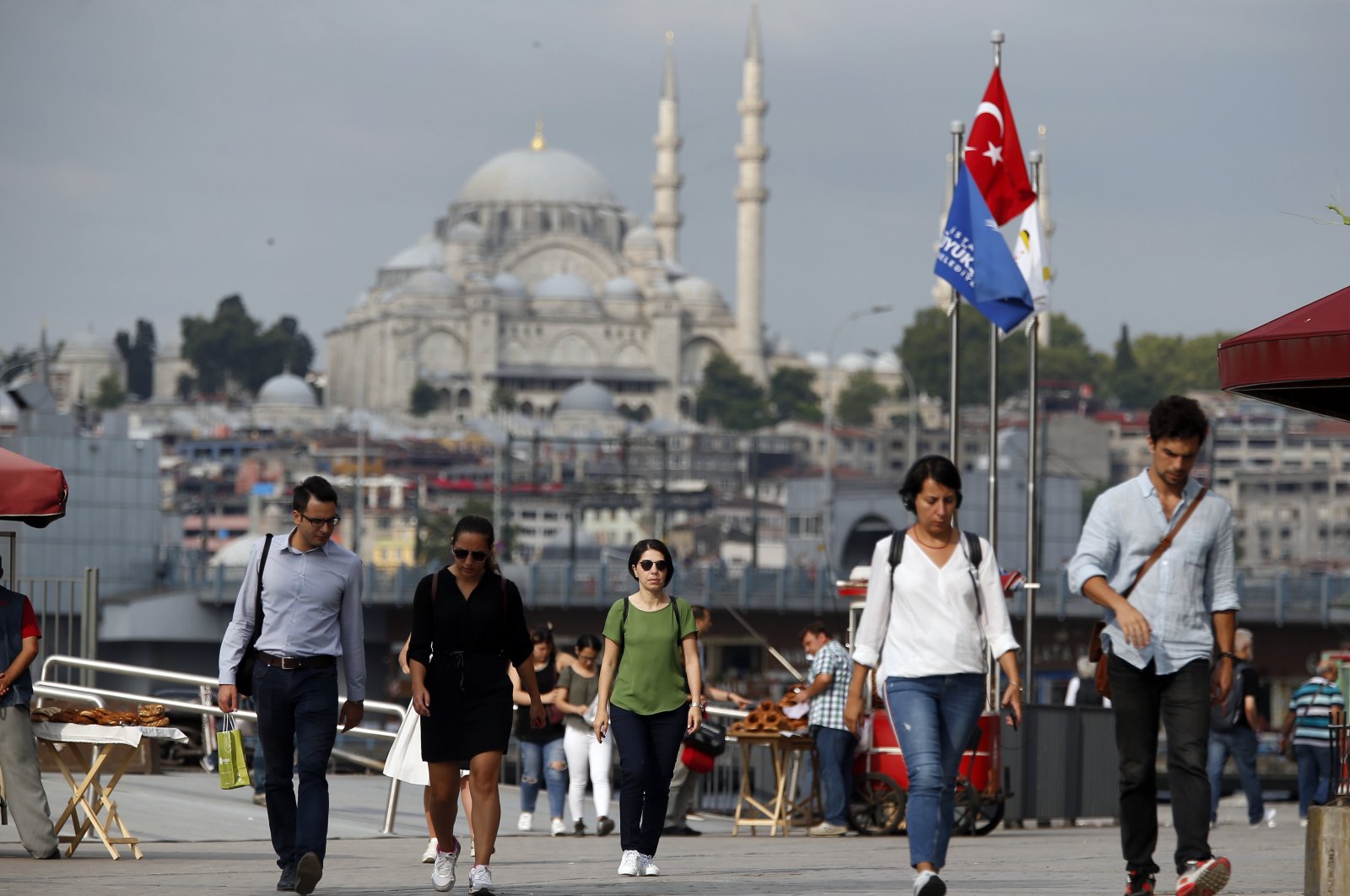 Pedestrians walk in Istanbul, Türkiye, July 19, 2018. (AP Photo)